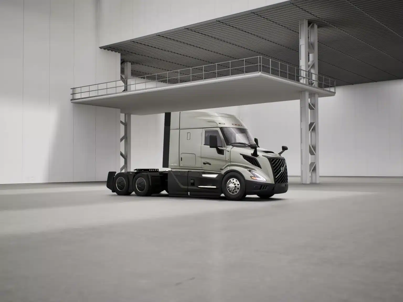 Grey all-new Volvo VNL 440 parked in a factory front right facing