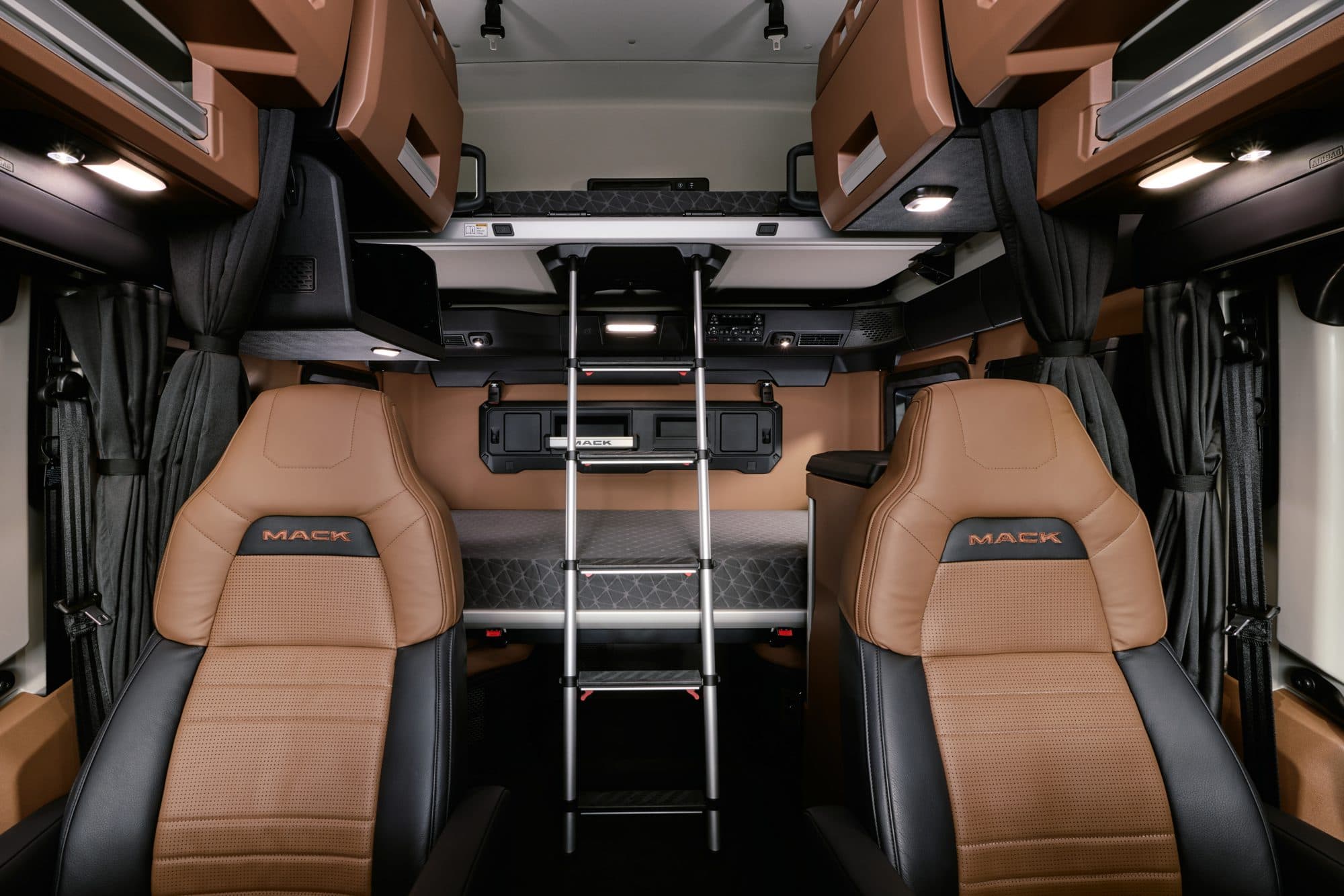 Interior cabin of Mack Pioneer with brown and black leather interior