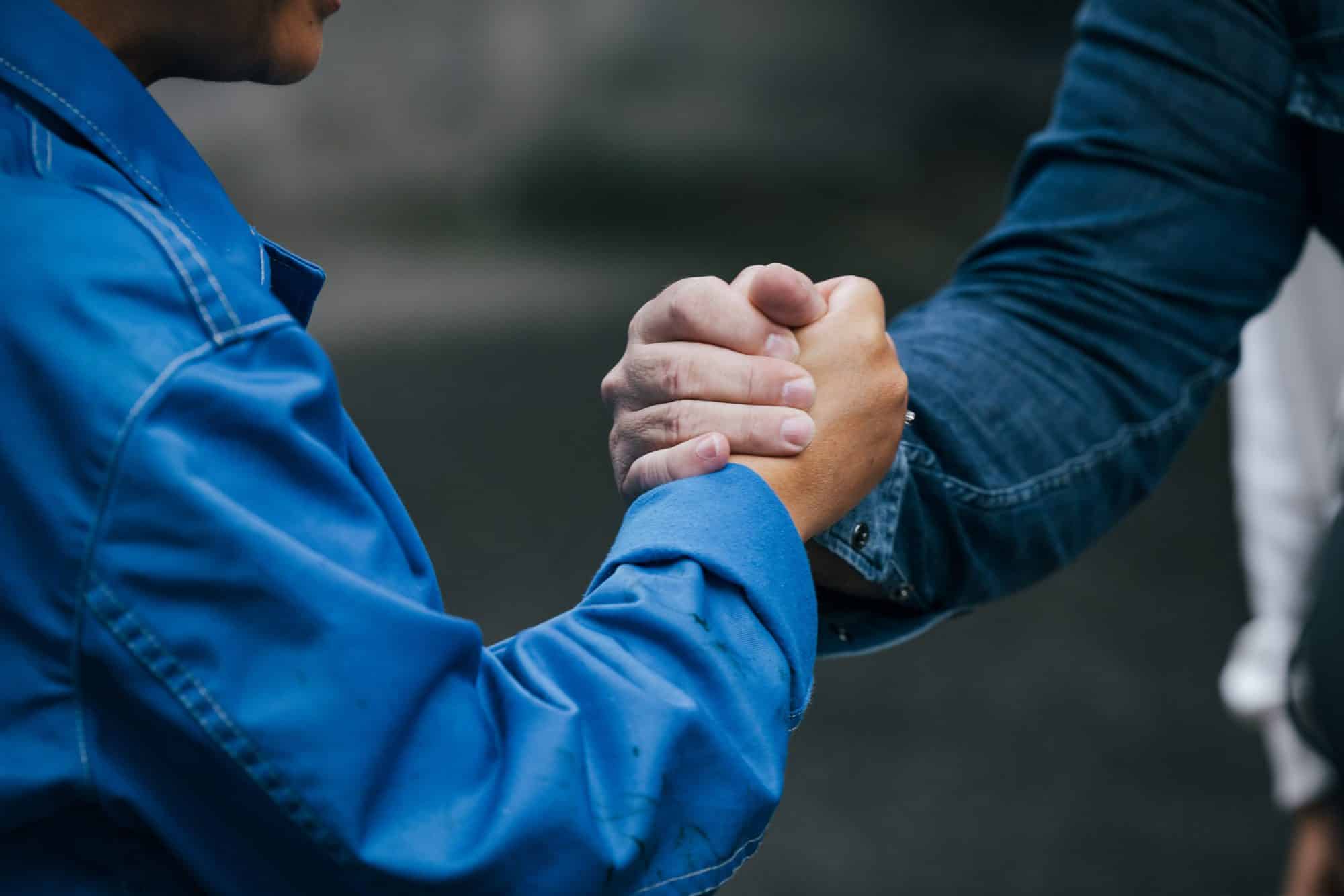Two people shaking hands