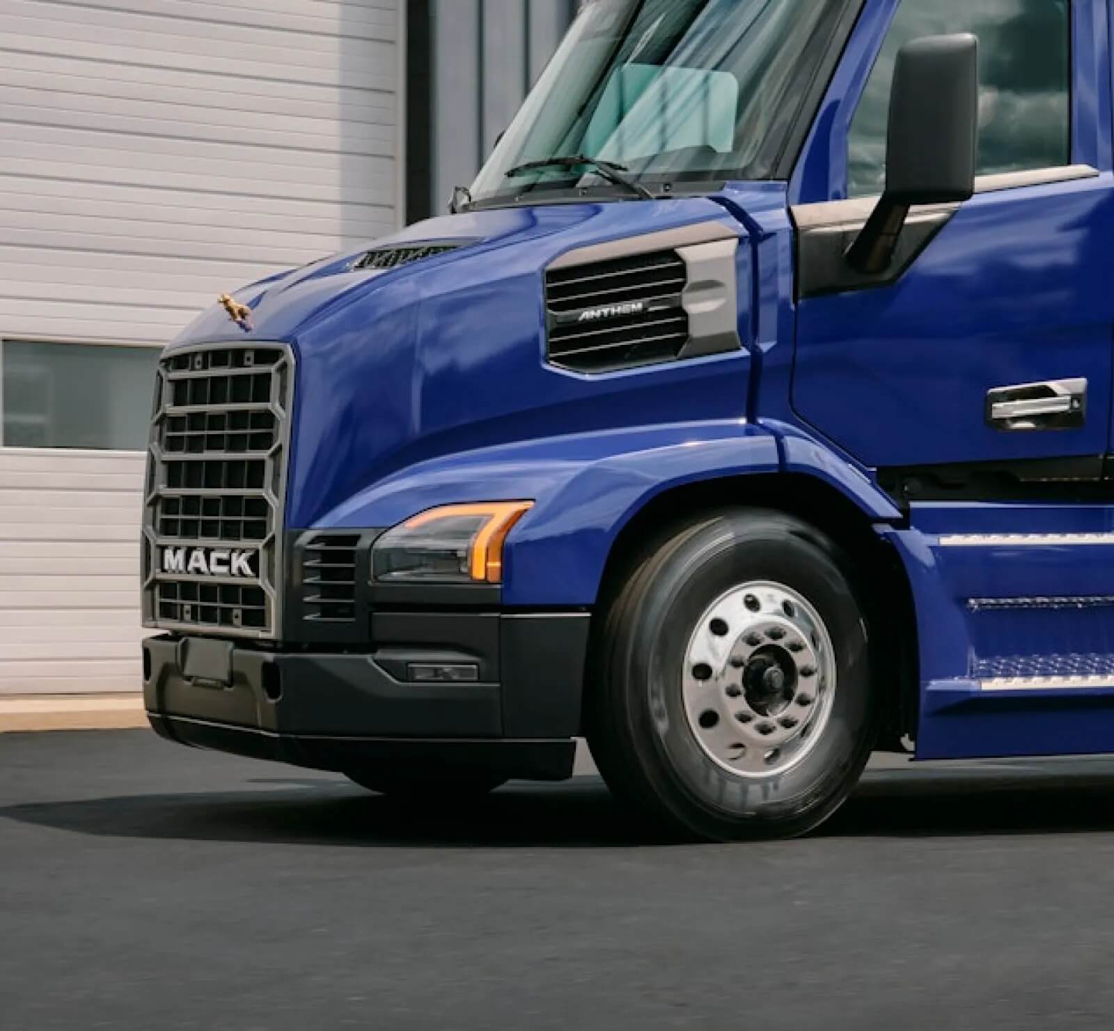 Side profile of a blue all-new Mack Anthem