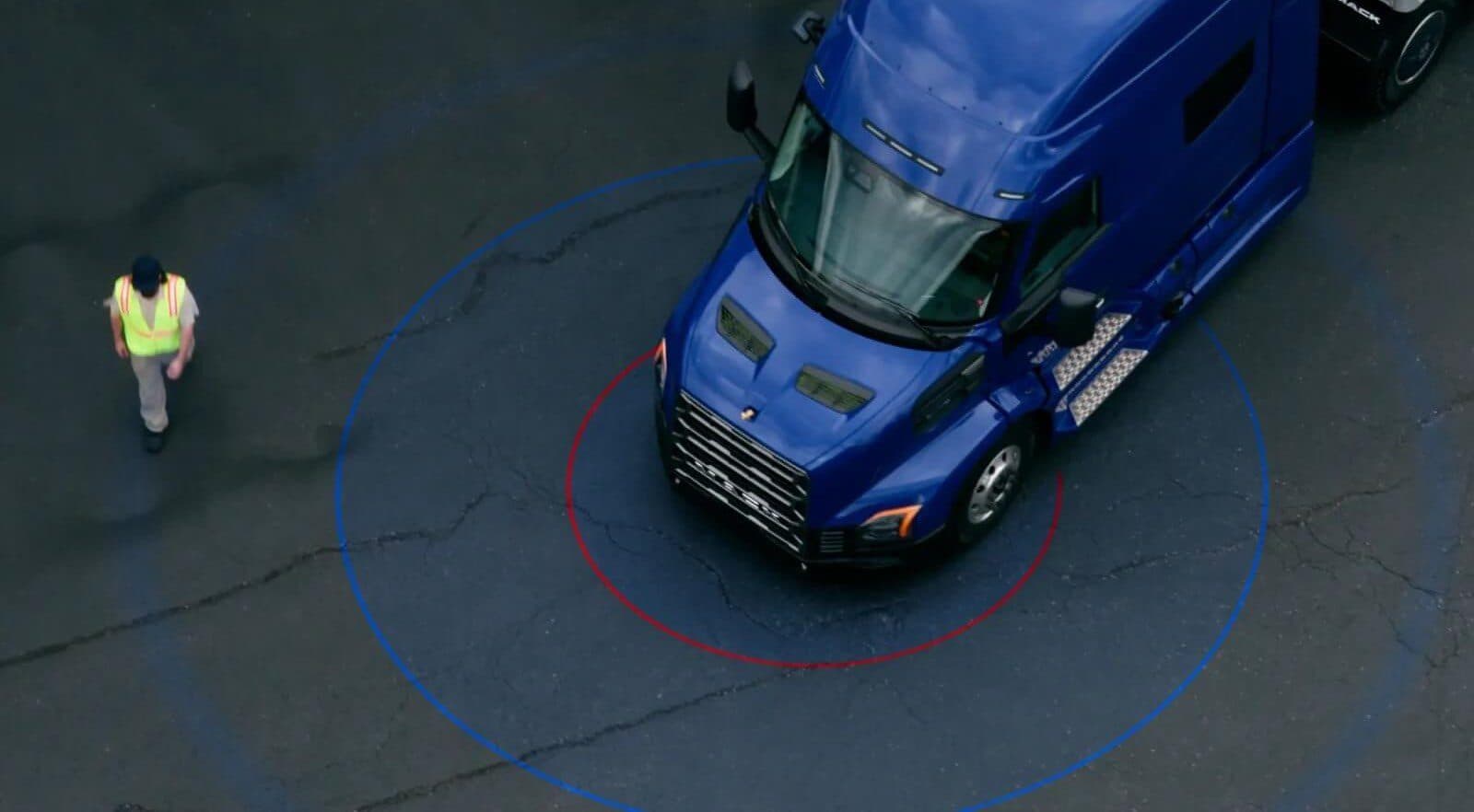 Mack Protect Safety Suites using advanced radar and camera technology to detect a man in front of the all-new Anthem