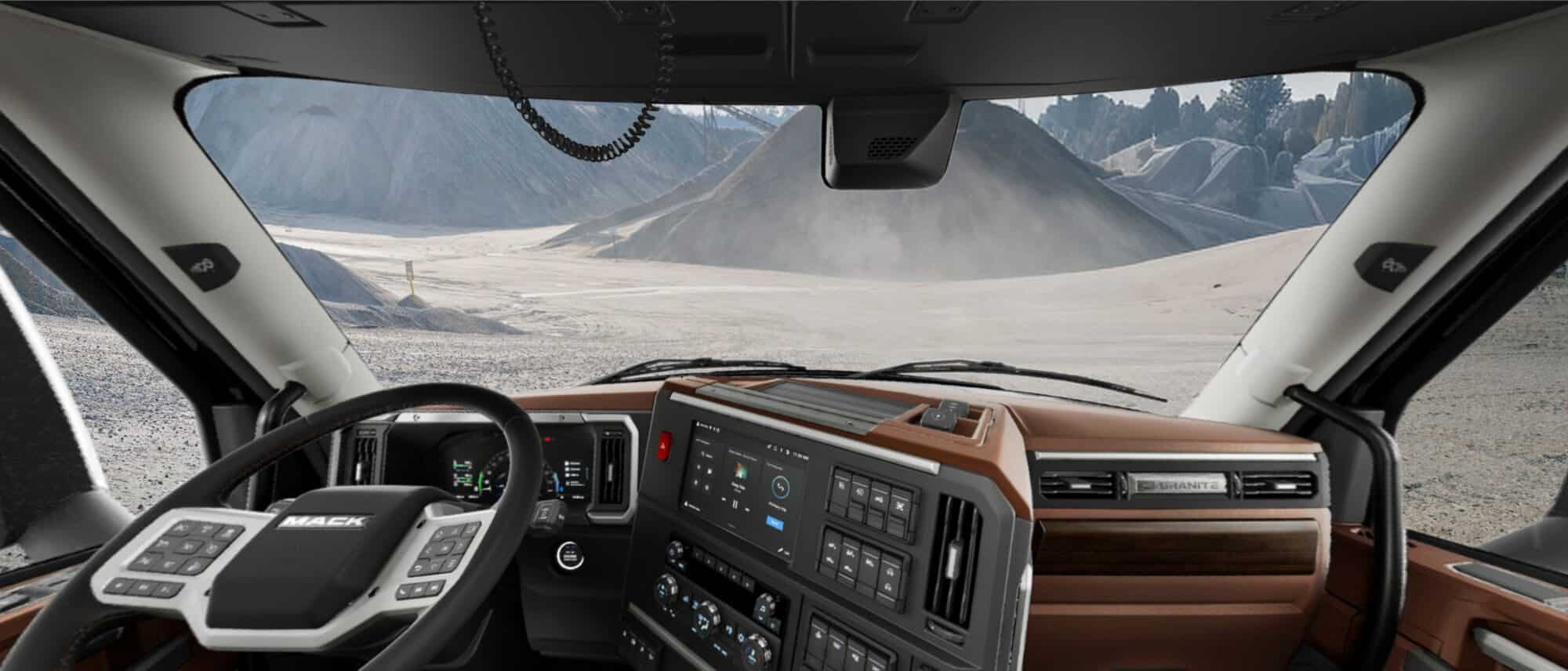 Interior of Mack Granite windshield , steering wheel, dashboard.