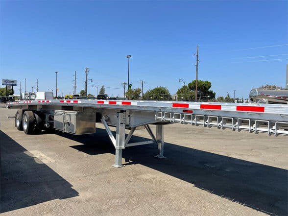 Photo of 2024 WABASH 48′ FLATBED – REAR AXLE SLIDER – FRONT LIFT – DISC